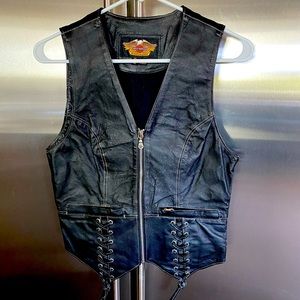 Never worn HD zip, laced and lined leather VEST